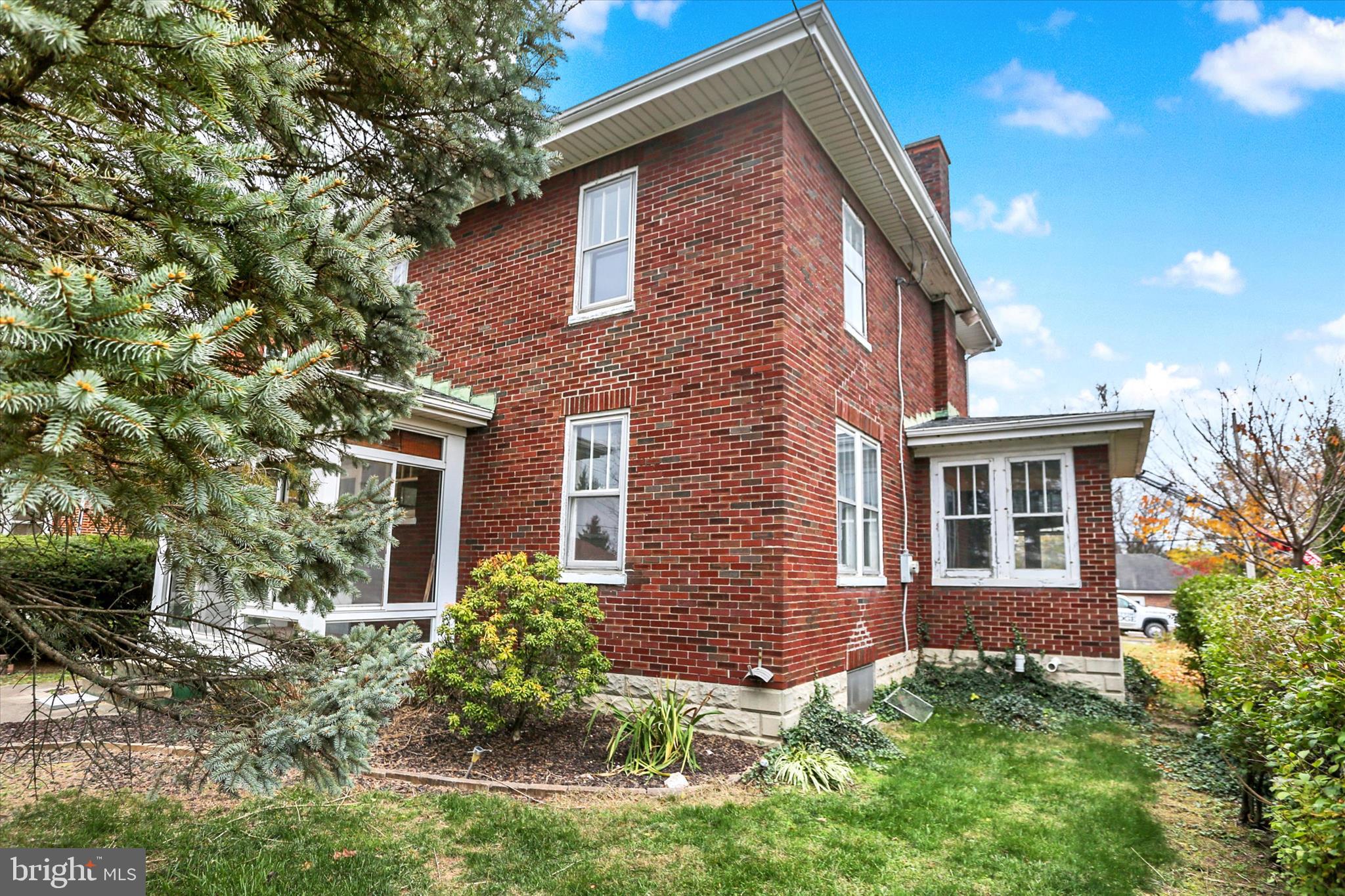 711 Pine Street Steelton, PA 17113 - Photo 31 of 37 a front view of a house with garden