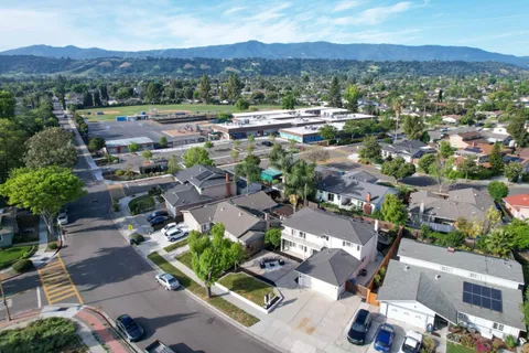 an aerial view of residential house with outdoor space