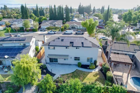an aerial view of a house with a garden