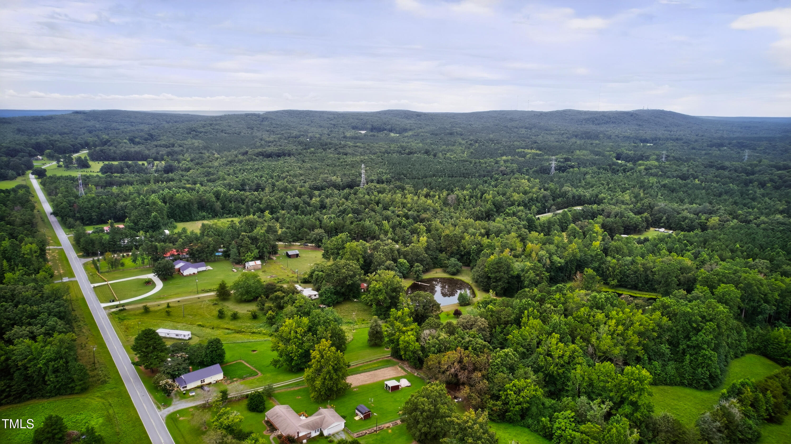 0 Thompson Mill Road Graham, NC 27253 - Photo 18 of 19 a view of a garden with mountains in the background
