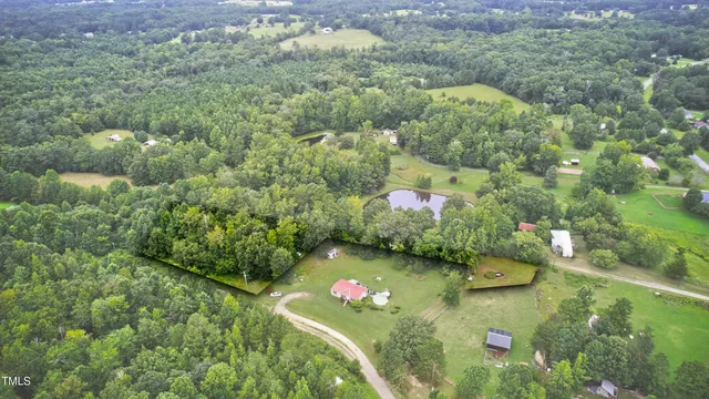 a view of a lake with green space