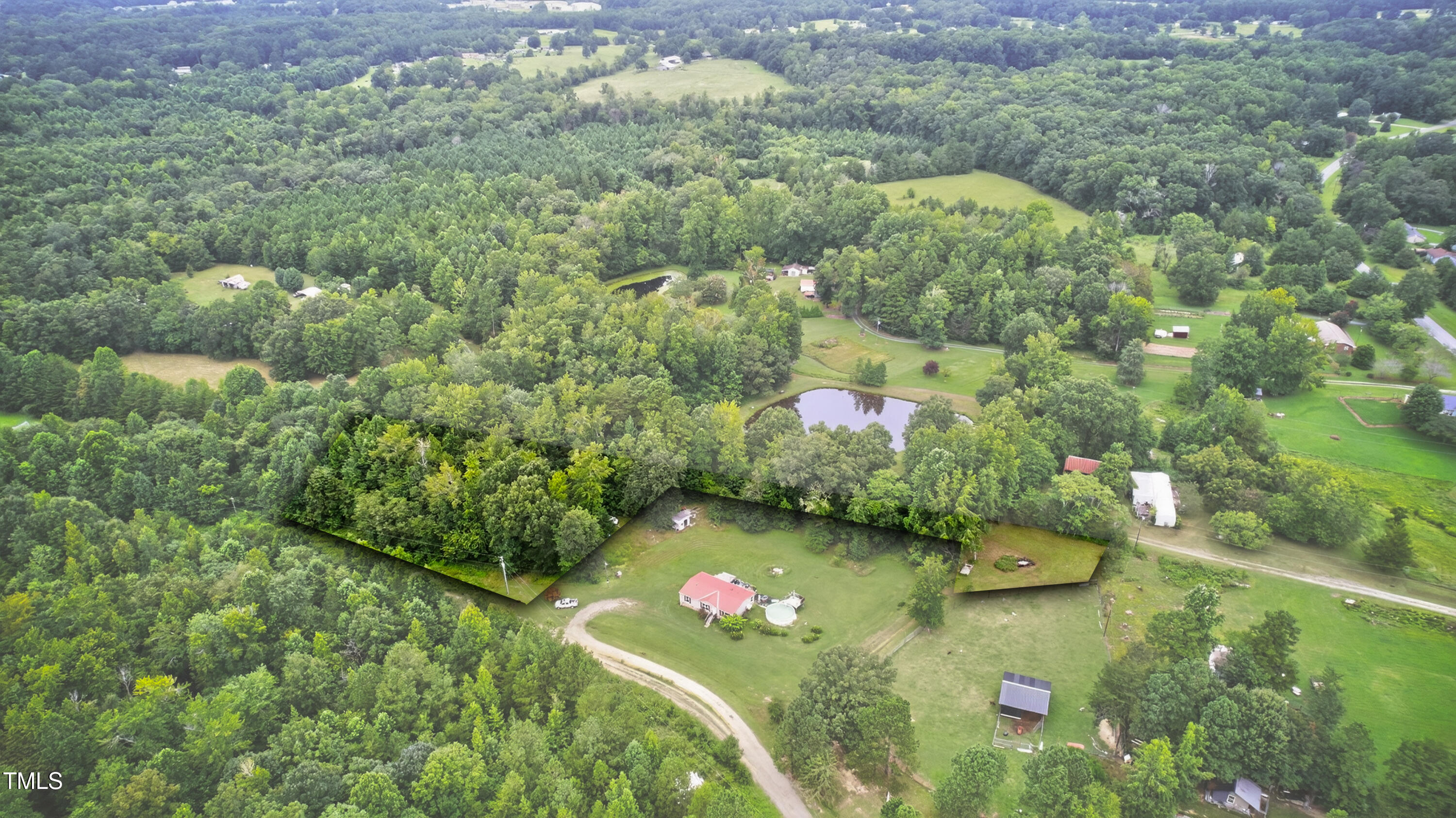 0 Thompson Mill Road Graham, NC 27253 - Photo 4 of 19 a view of a lake with green space