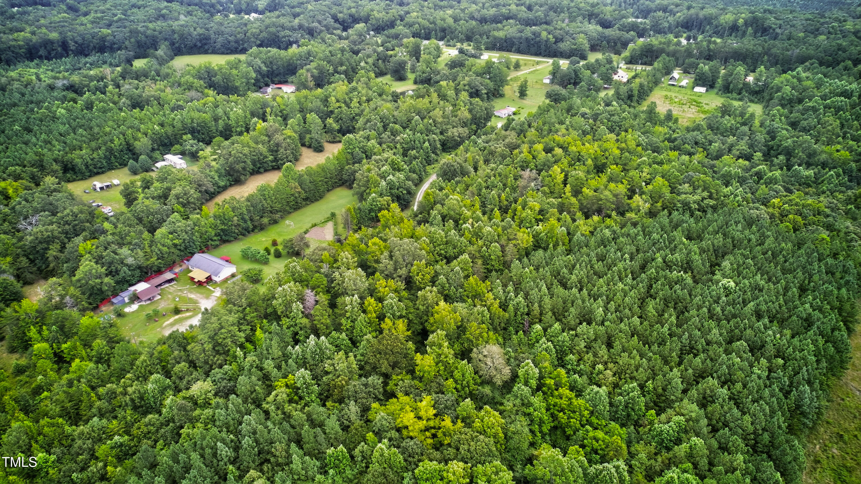 0 Thompson Mill Road Graham, NC 27253 - Photo 9 of 19 a backyard of a house with lots of green space