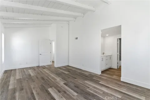 a kitchen with sink and cabinets