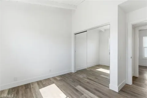 a bathroom with a double vanity sink toilet and a mirror