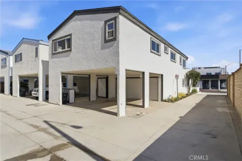 a front view of a house with a garage