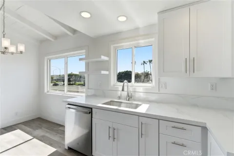 a bathroom with a sink and a window