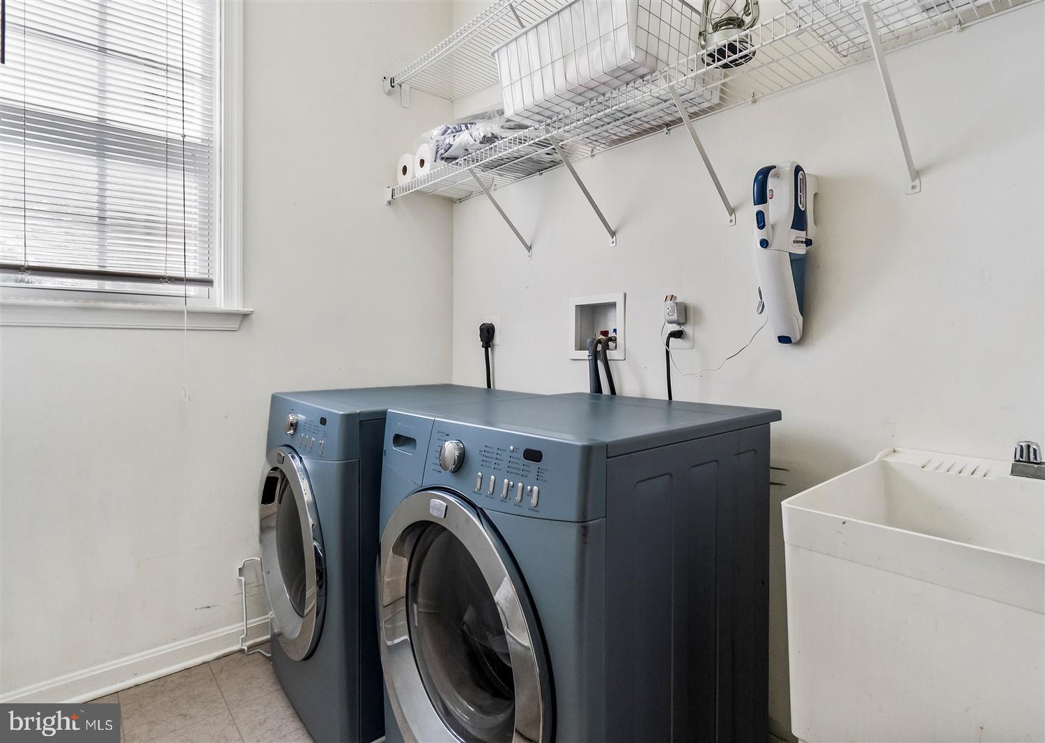 9731 Eustice Road Randallstown, MD 21133 - Photo 16 of 38 First floor Laundry room w/utility sink.
