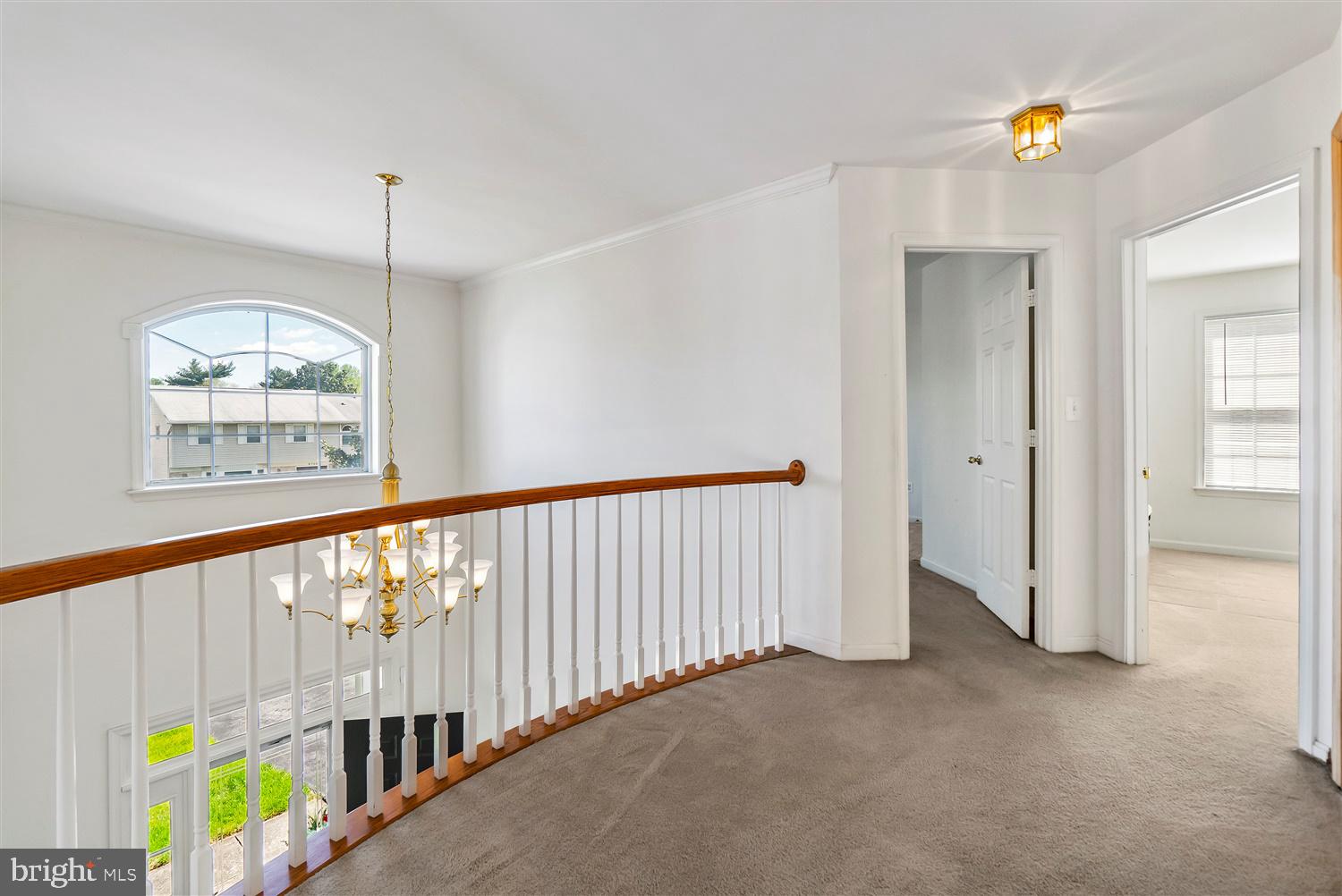 9731 Eustice Road Randallstown, MD 21133 - Photo 23 of 38 Second floor balcony/hall overlook