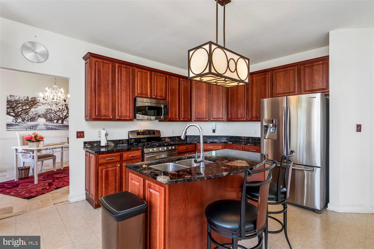 9731 Eustice Road Randallstown, MD 21133 - Photo 9 of 38 Kitchen with granite counter tops.