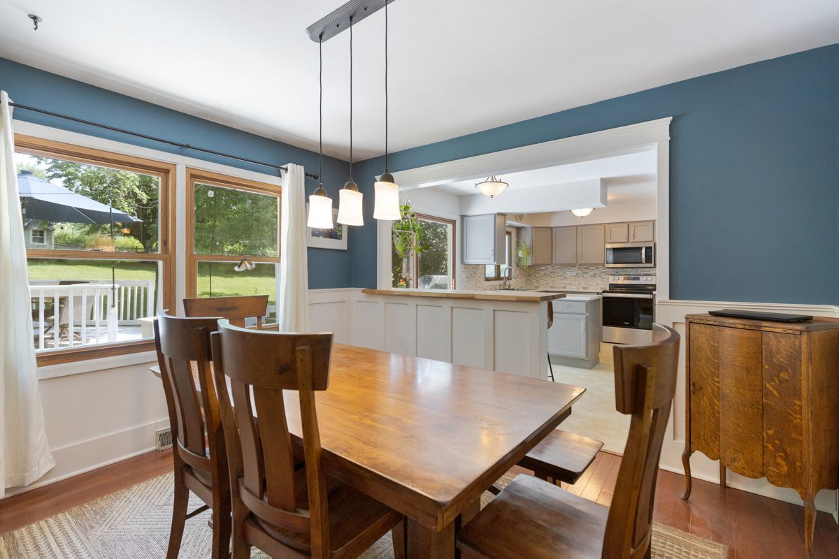 41W360 Muirhead Road Elgin, IL 60124 - Photo 11 of 32 a view of a dining room with furniture window and wooden floor