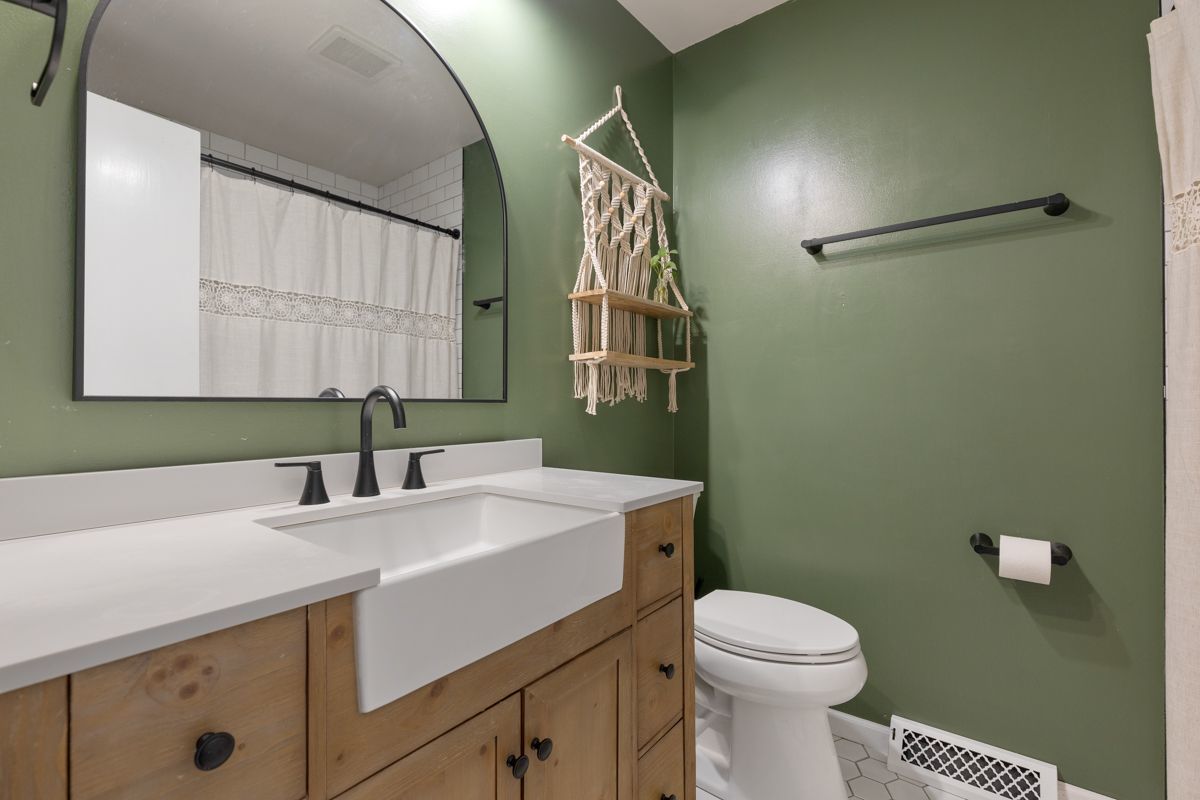 41W360 Muirhead Road Elgin, IL 60124 - Photo 17 of 32 a bathroom with a sink and a mirror