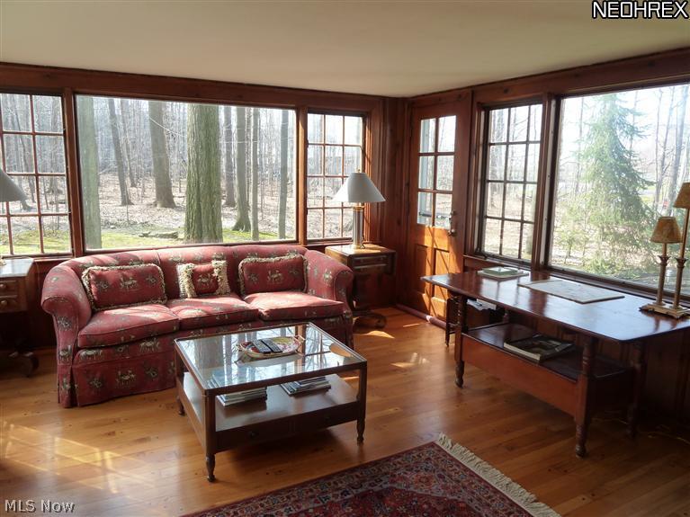 6945 Gates Road Gates Mills, OH 44040 - Photo 7 of 25 Knotty pine light filled sunroom