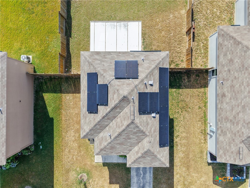 137 Bridges Lane Jarrell, TX 76537 - Photo 30 of 34 an aerial view of a house with large trees