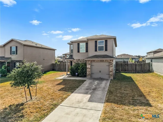 a house view with a outdoor space