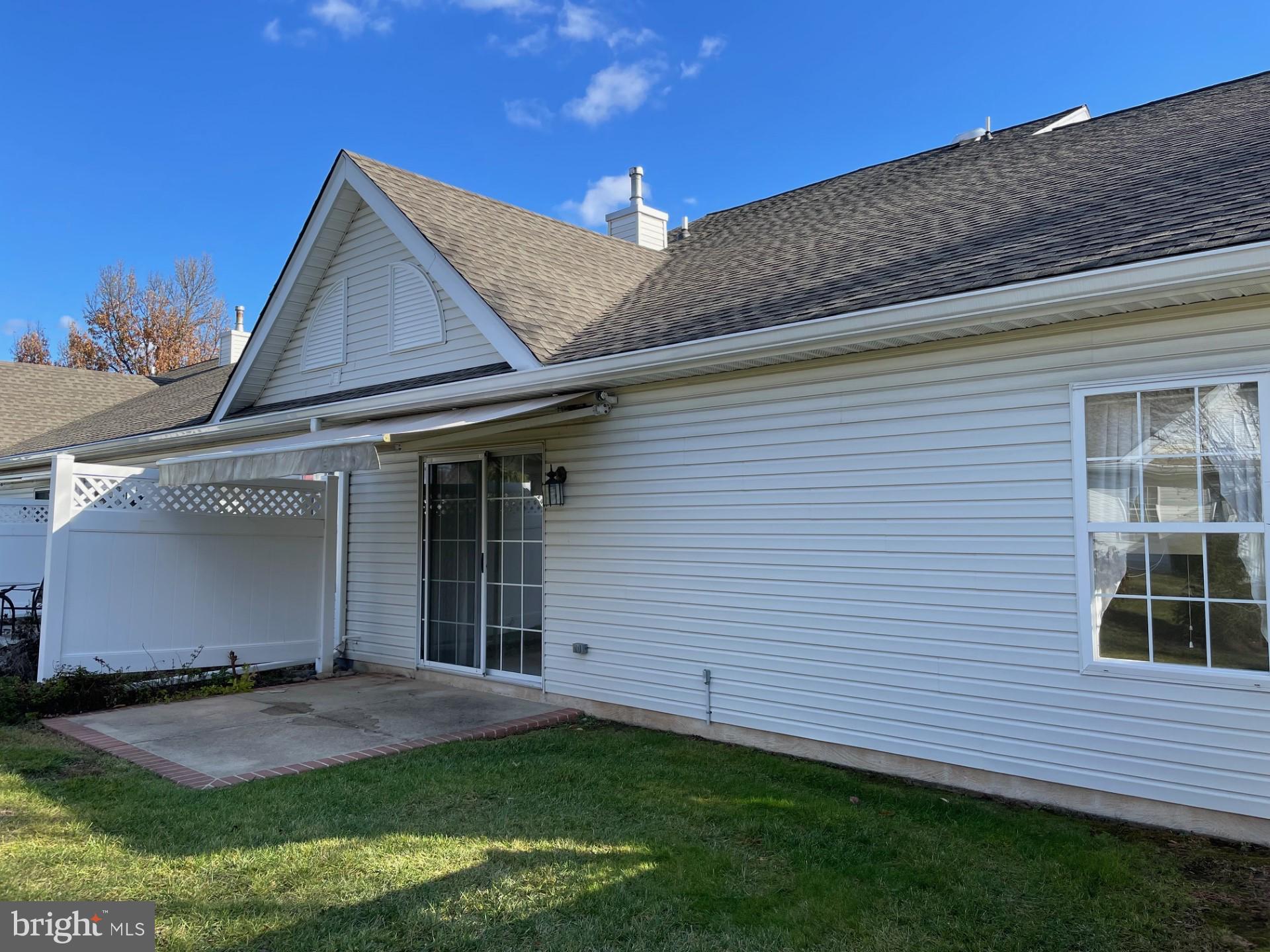 161 Progress Drive Doylestown, PA 18901 - Photo 22 of 23 Back with retractable awning