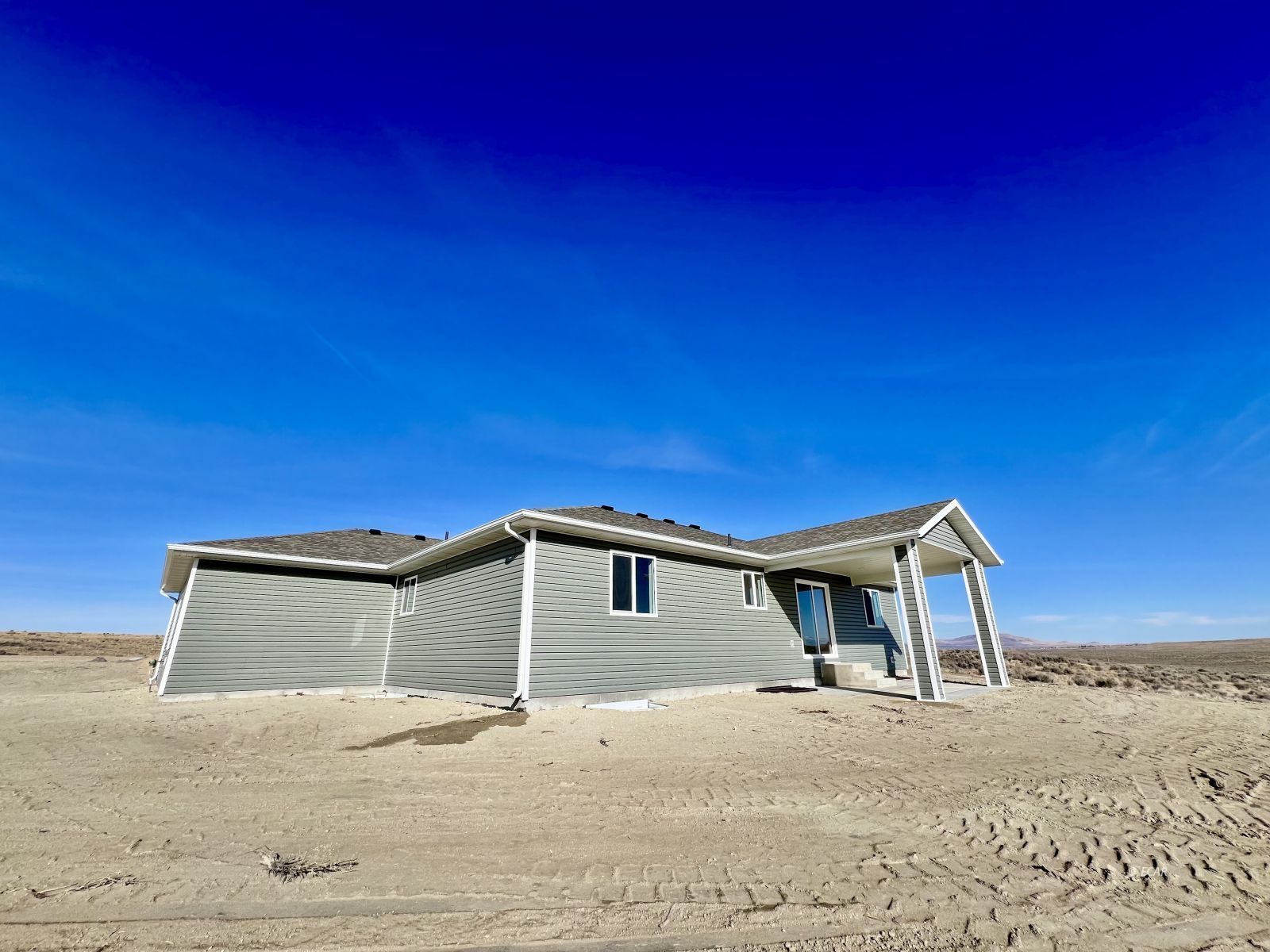 1096 Sun Vly Road Spring Creek, NV 89815 - Photo 28 of 31 a front view of a house with a yard
