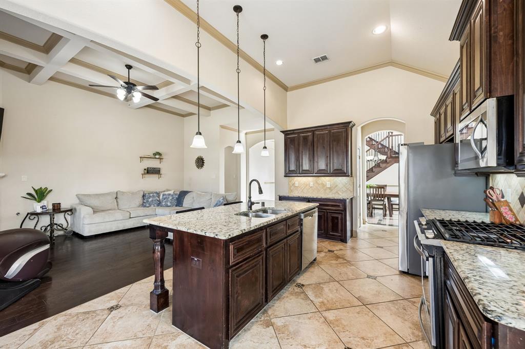 1341 Canary Lane Forney, TX 75126 - Photo 10 of 34 Kitchen with walk in pantry.