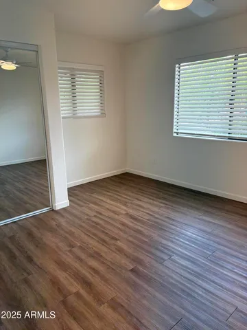 a bathroom with a shower and a toilet