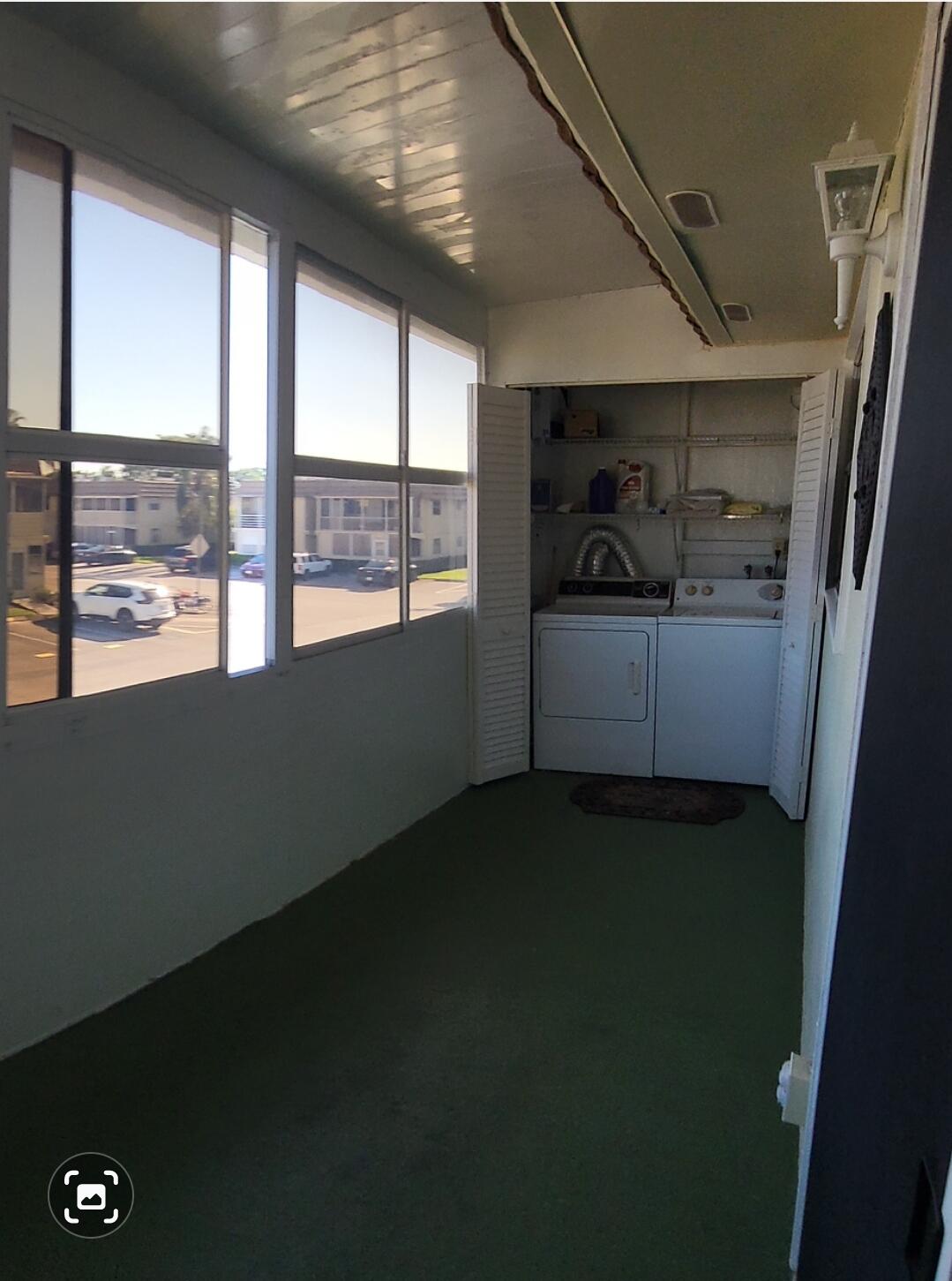 141 Saxony Drive, Unit 141 Delray Beach, FL 33446 - Photo 14 of 14 Patio/Laundryarea