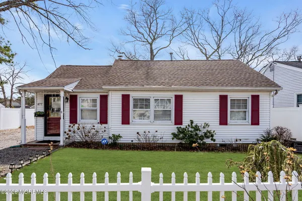 a front view of house with yard