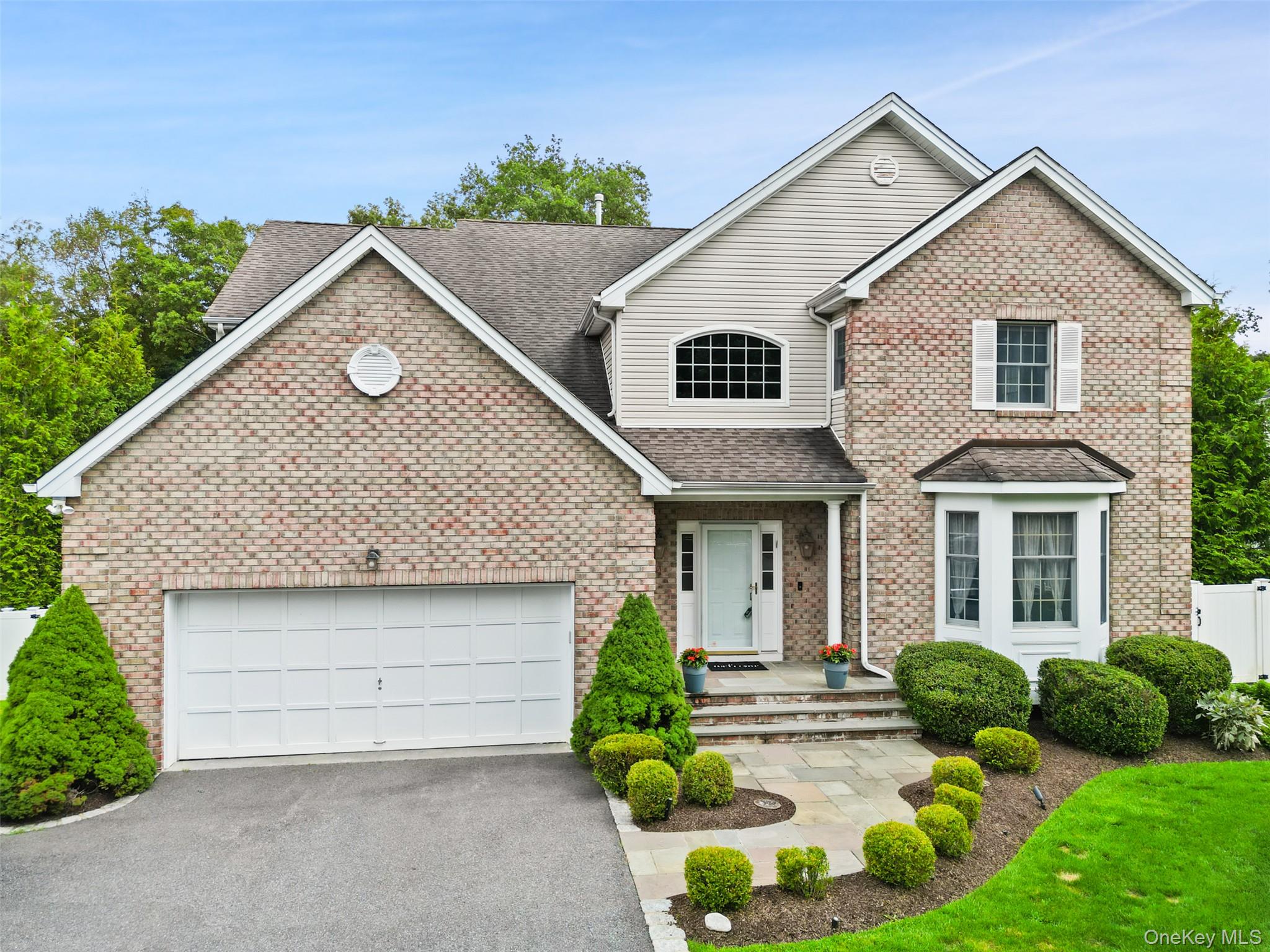 14 Putney Road Baldwin Place, NY 10505 - Photo 1 of 1 front view of a house with a yard