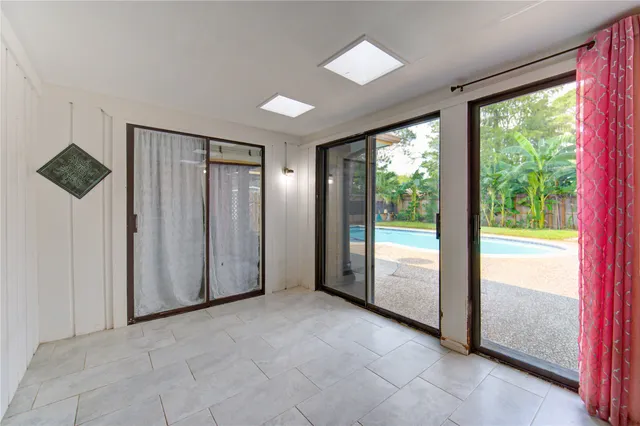 a view of an empty room and window