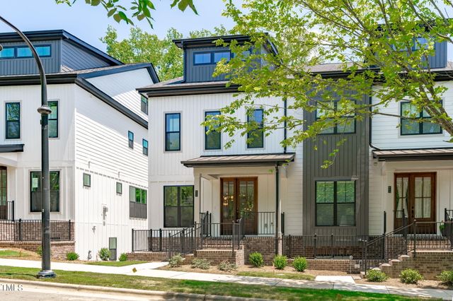 an aerial view of a house with a garden
