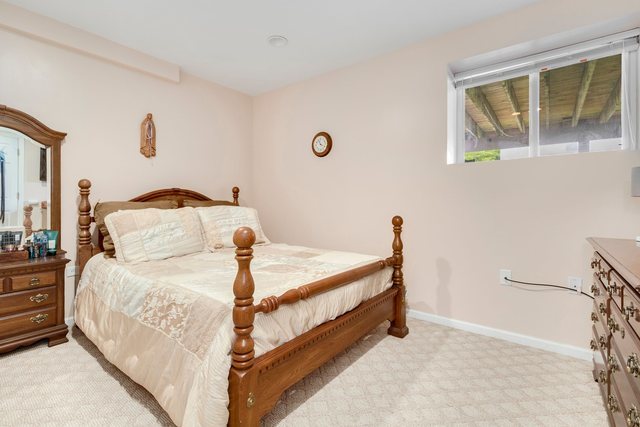 Undisclosed Address Bartlett, IL 60103 - Photo 36 of 45 a bedroom with a bed and window