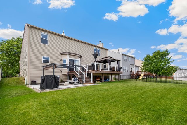 Undisclosed Address Bartlett, IL 60103 - Photo 41 of 45 a view of a house with backyard