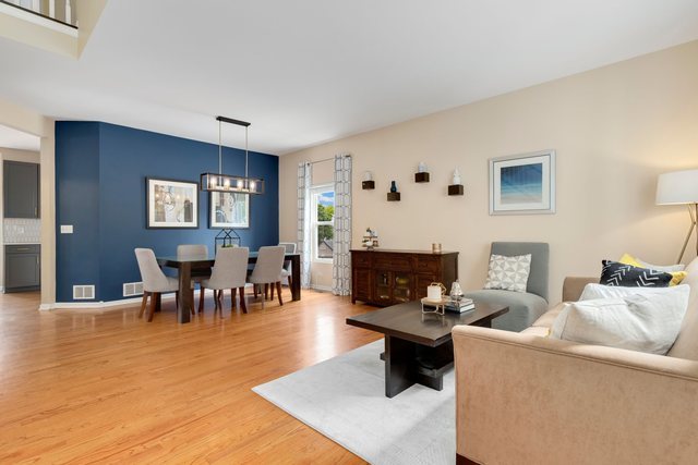 Undisclosed Address Bartlett, IL 60103 - Photo 5 of 45 a living room with furniture and wooden floor