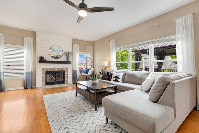 Undisclosed Address Bartlett, IL 60103 - Photo 8 of 45 a living room with furniture and a fireplace