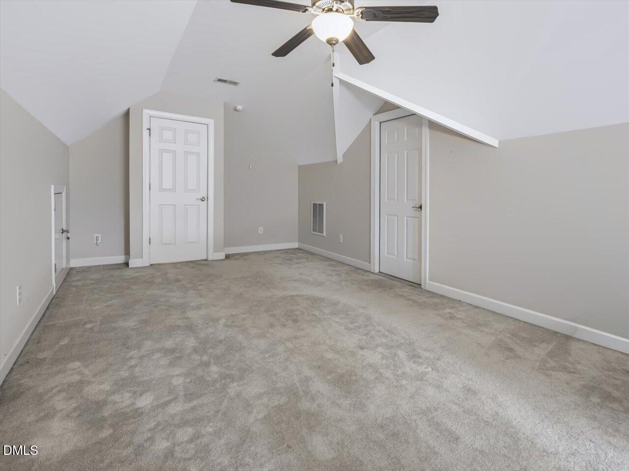 450 Ryan Road Pittsboro, NC 27312 - Photo 49 of 73 Bedroom 4 - Upstairs - Corner View with View of Door to Staircase and Unfinished Attic