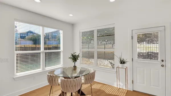 a kitchen with sink refrigerator and microwave
