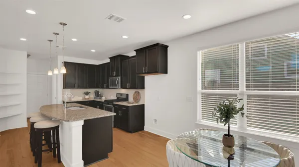 a bathroom with a sink and mirror