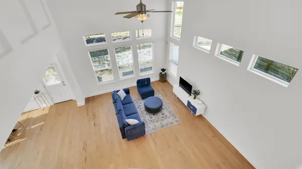 a view of a livingroom with stairs and stairs