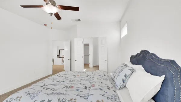 a spacious bathroom with a double vanity sink shower and a mirror