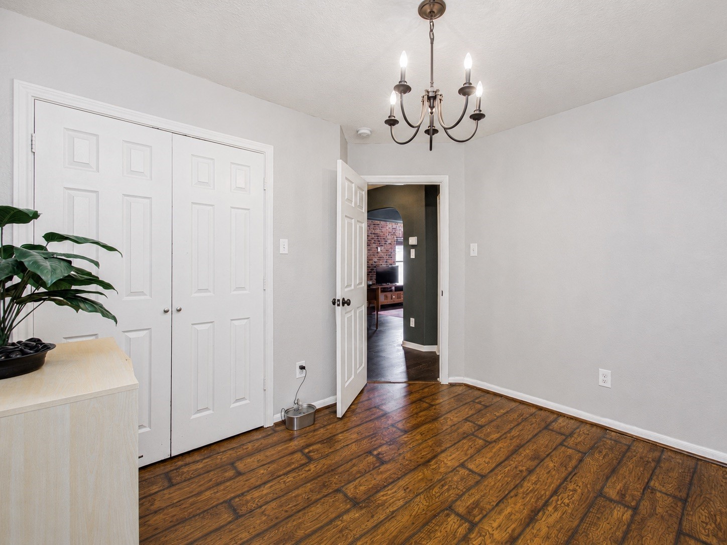 8647 Suburban Oaks Road Houston, TX 77093 - Photo 17 of 21 From this angle, the flooring continues toward the main living areas. (photo has been enhanced for marketing purposes)