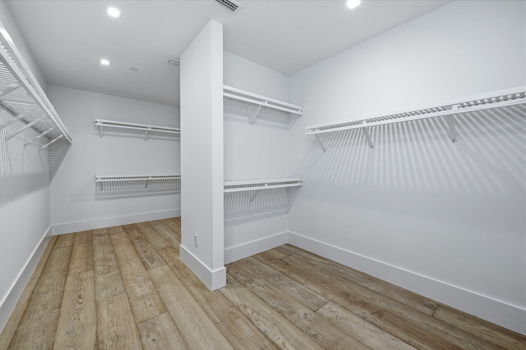 3291 Dorado Lane, Unit 101 Naples, FL 34114 - Photo 14 of 50 a view of an empty walk in closet