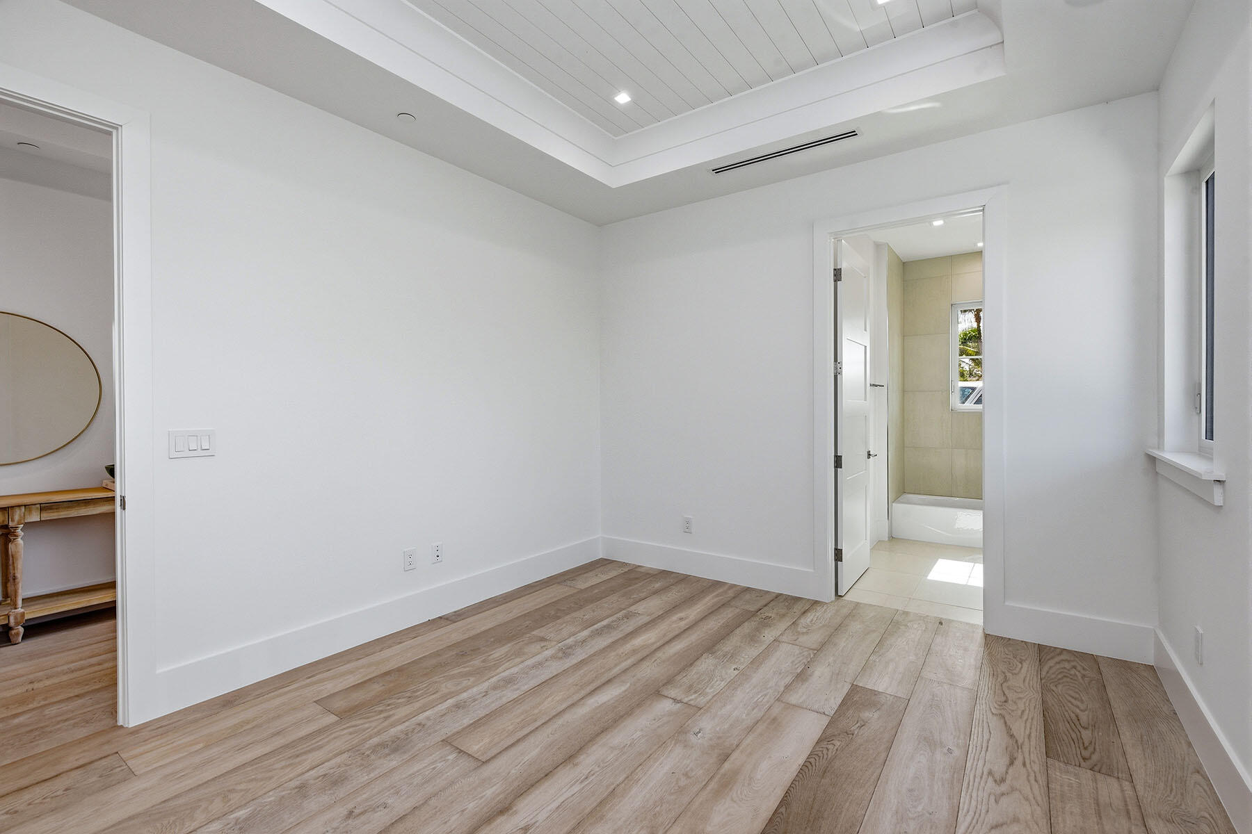 3291 Dorado Lane, Unit 101 Naples, FL 34114 - Photo 16 of 50 wooden floor in an empty room
