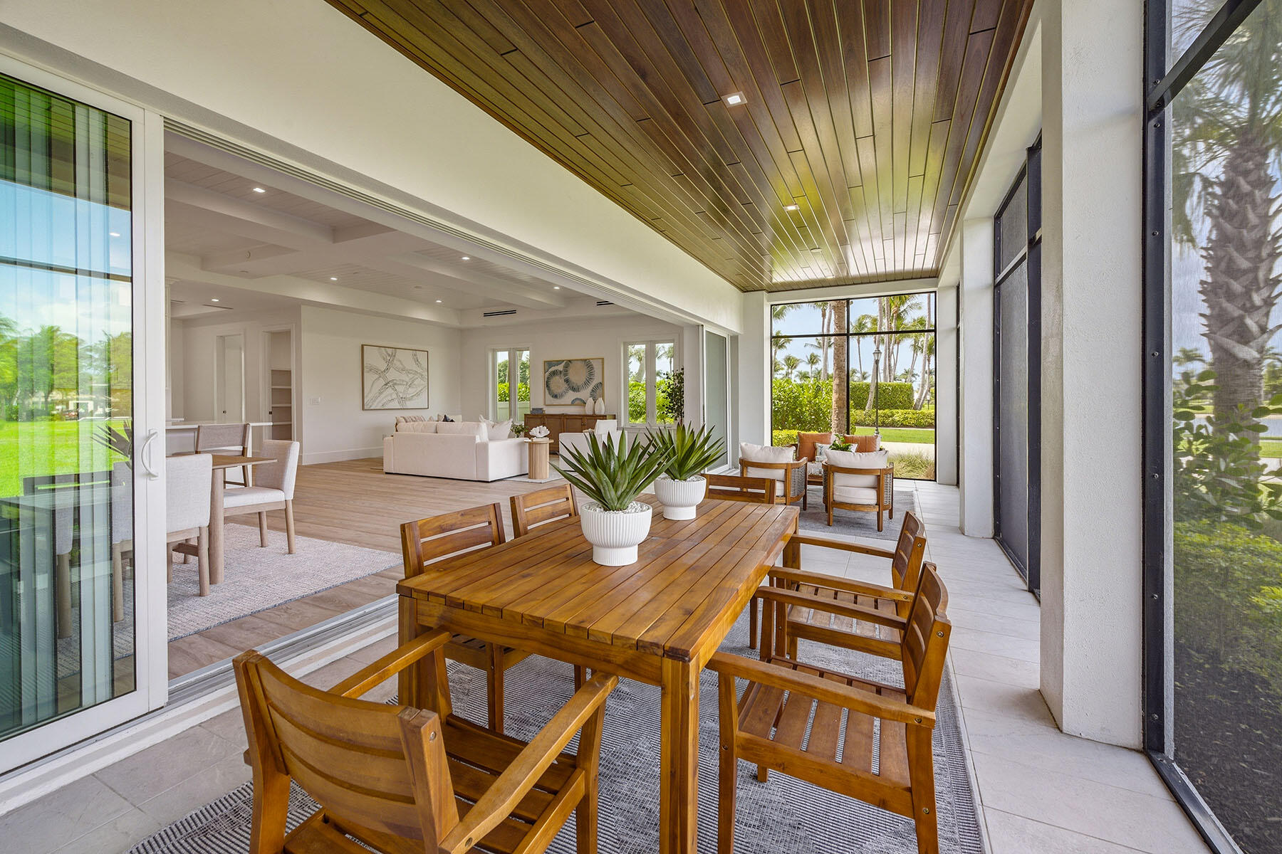 3291 Dorado Lane, Unit 101 Naples, FL 34114 - Photo 23 of 50 a view of a dining room with furniture window and wooden floor