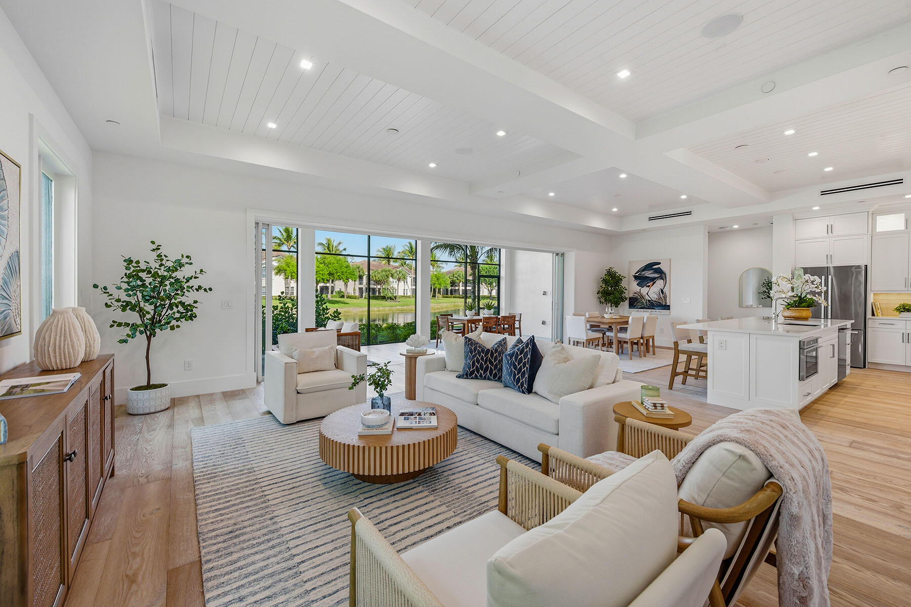 3291 Dorado Lane, Unit 101 Naples, FL 34114 - Photo 3 of 50 a living room with furniture and a large window
