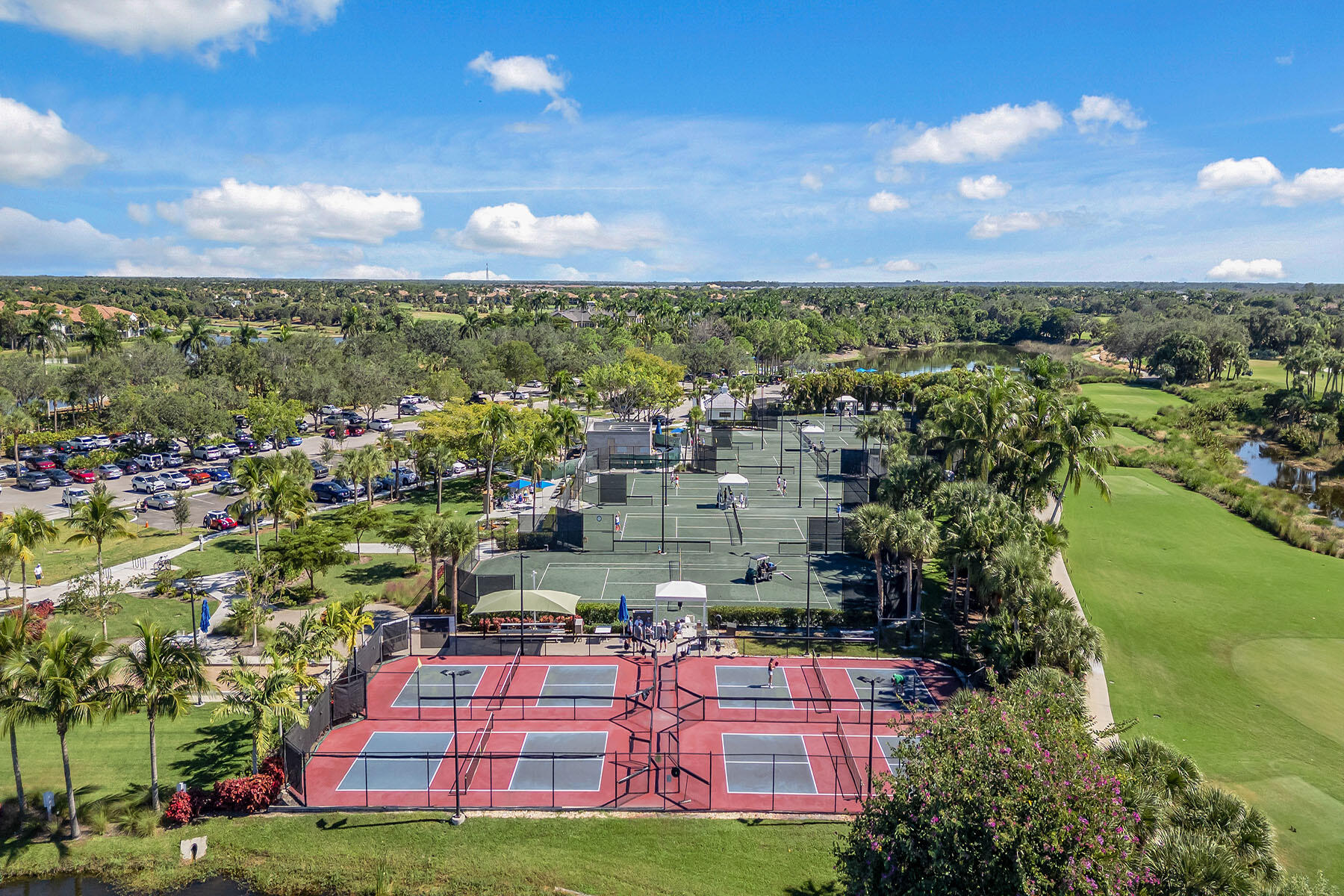 3291 Dorado Lane, Unit 101 Naples, FL 34114 - Photo 44 of 50 a view of a city with lots of residential buildings ocean and mountain view in back