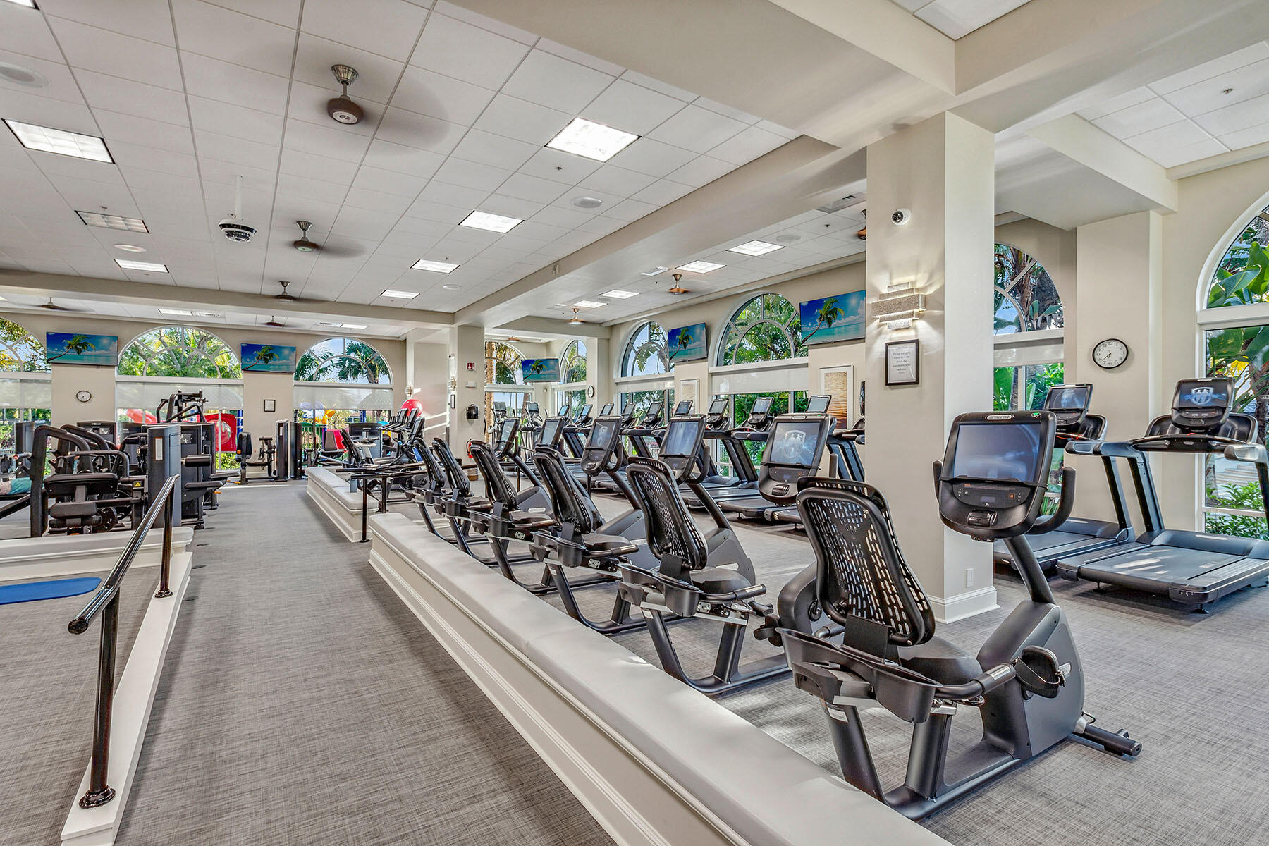 3291 Dorado Lane, Unit 101 Naples, FL 34114 - Photo 45 of 50 a view of a room with gym equipment