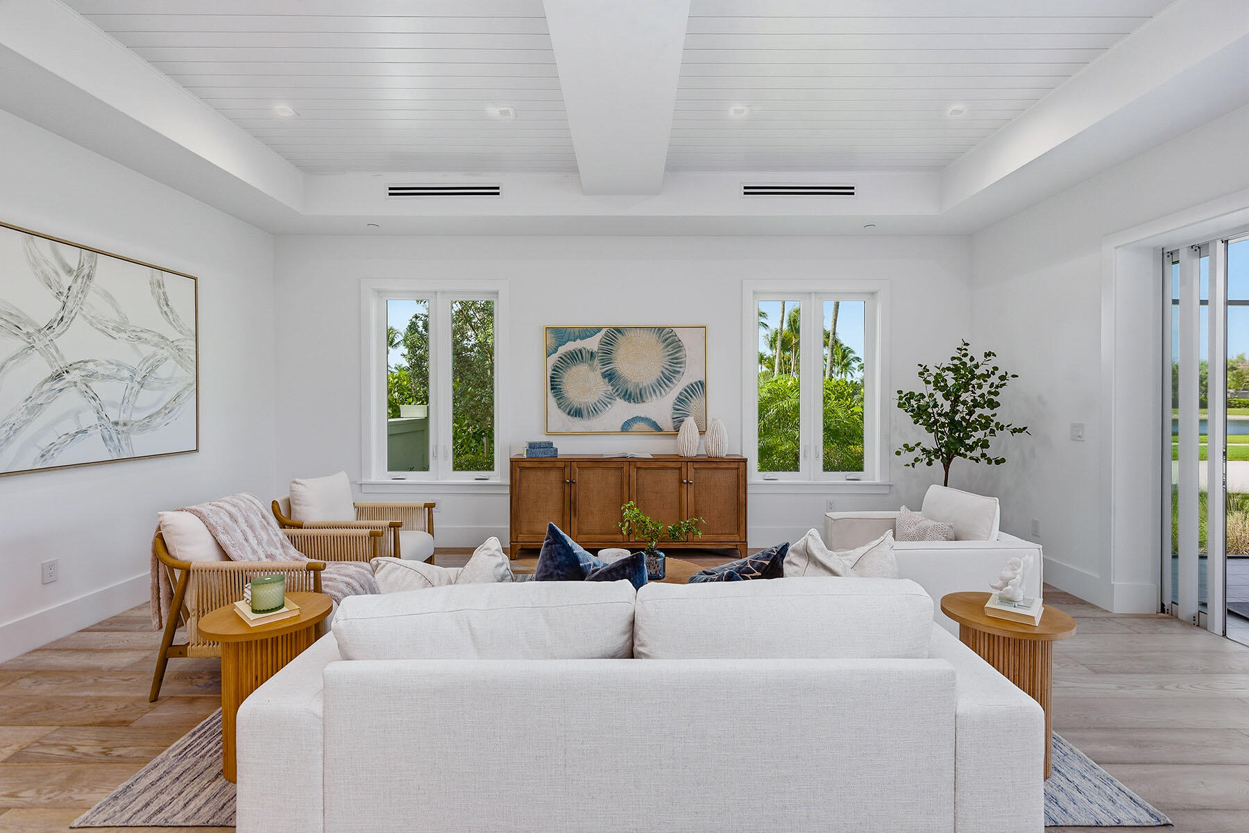3291 Dorado Lane, Unit 101 Naples, FL 34114 - Photo 5 of 50 a living room with furniture and a large window