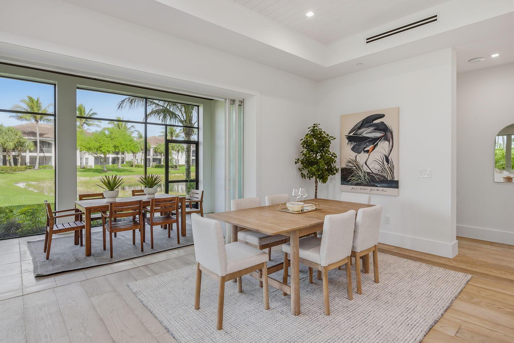 3291 Dorado Lane, Unit 101 Naples, FL 34114 - Photo 9 of 50 a view of a dining room with furniture window and outside view