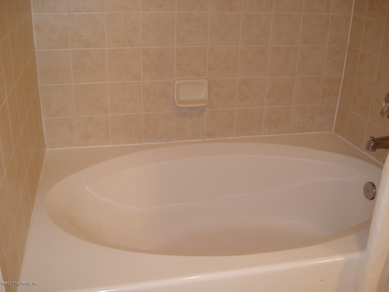 8550 Touchton Road, Unit 224 Jacksonville, FL 32216 - Photo 12 of 17 a bathroom with a bathtub
