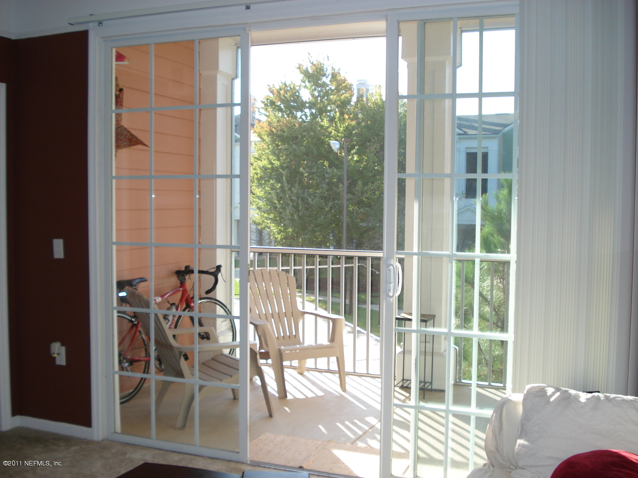 8550 Touchton Road, Unit 224 Jacksonville, FL 32216 - Photo 15 of 17 a view of a living room and a porch