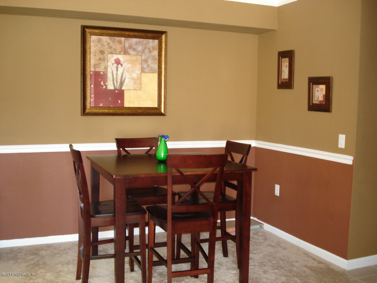 8550 Touchton Road, Unit 224 Jacksonville, FL 32216 - Photo 4 of 17 a view of a dining room with furniture