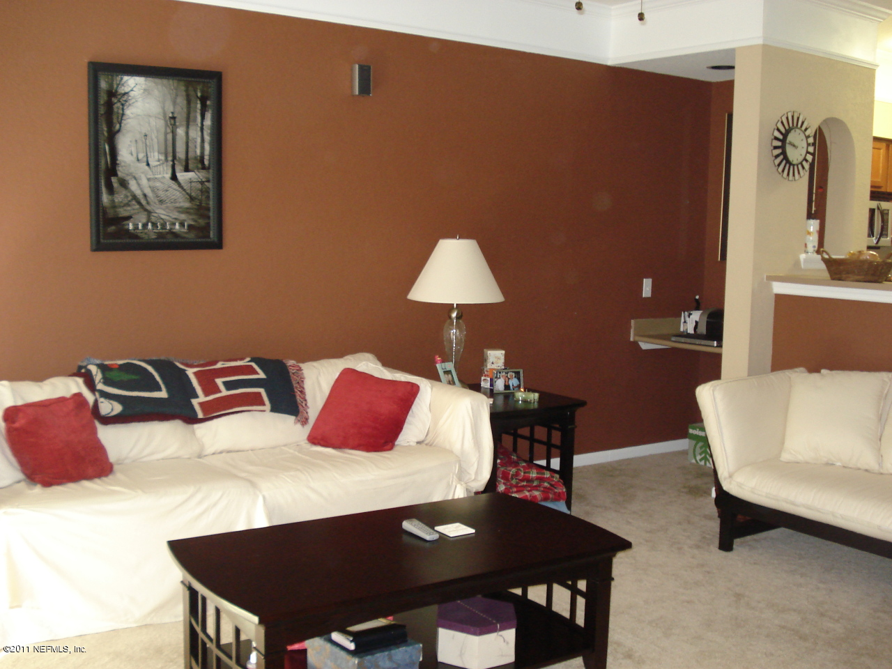 8550 Touchton Road, Unit 224 Jacksonville, FL 32216 - Photo 5 of 17 a bedroom with a bed and a table